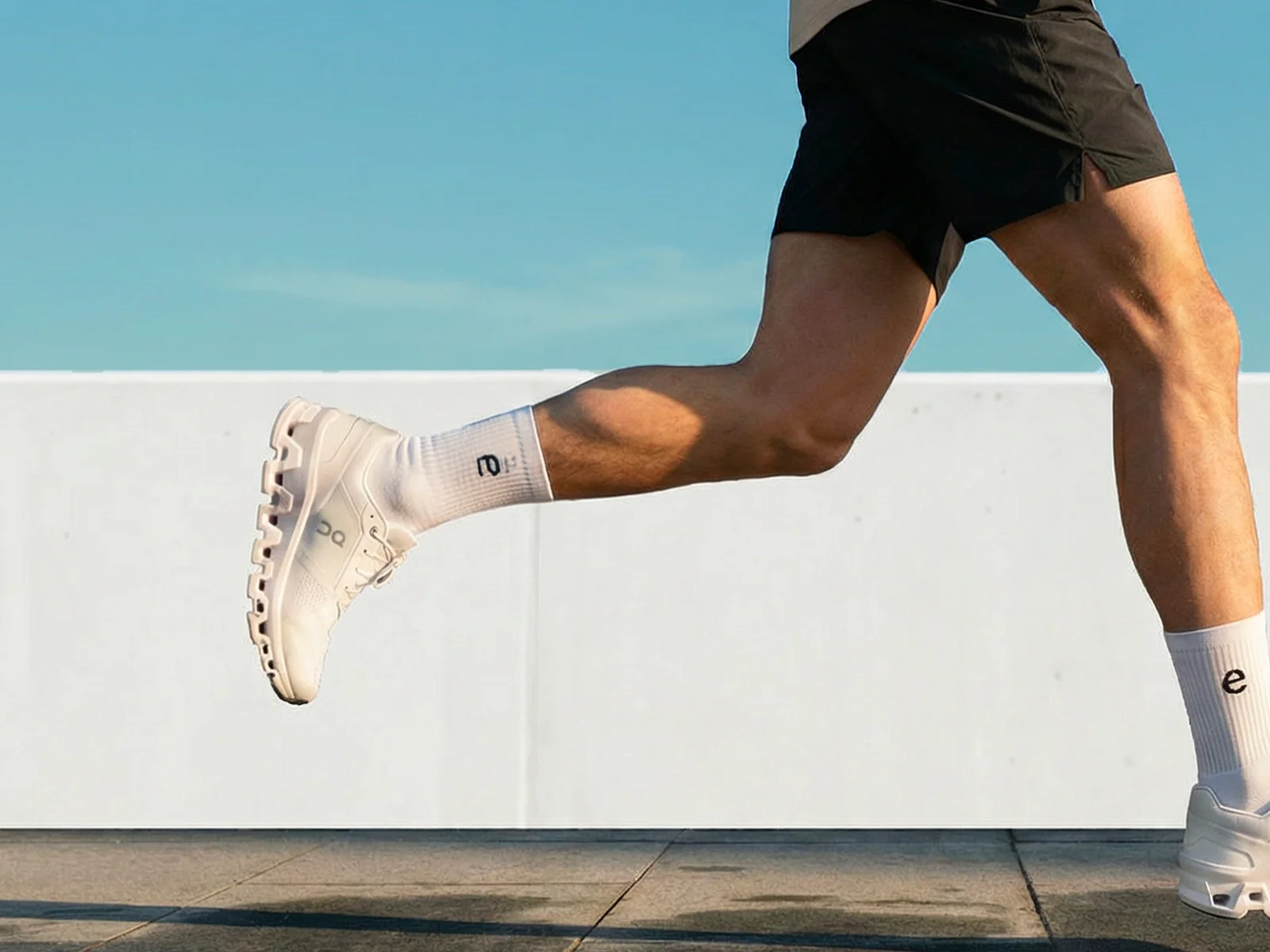 A man on a run in evopure socks and on running trainers
