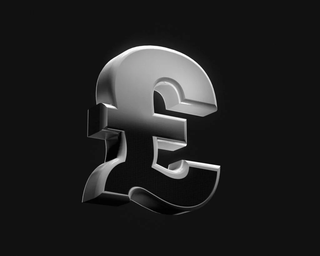 a shiny silver and black letter pound sign