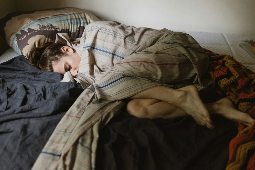 A person lying in bed