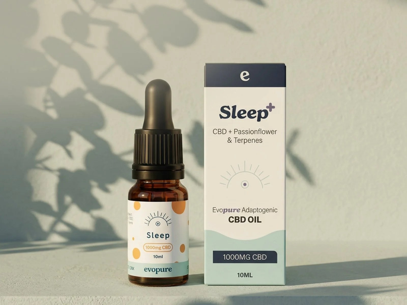 Evopure Sleep CBD oil bottle and box on a pale sage wall with leaf shadows