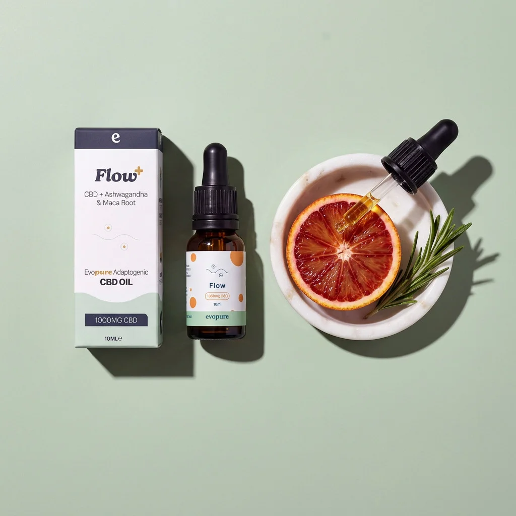 Evopure Flow+ CBD oil box and bottle with a blood orange and rosemary