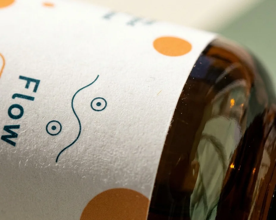 Close-up of the label on an Evopure Flow CBD oil bottle