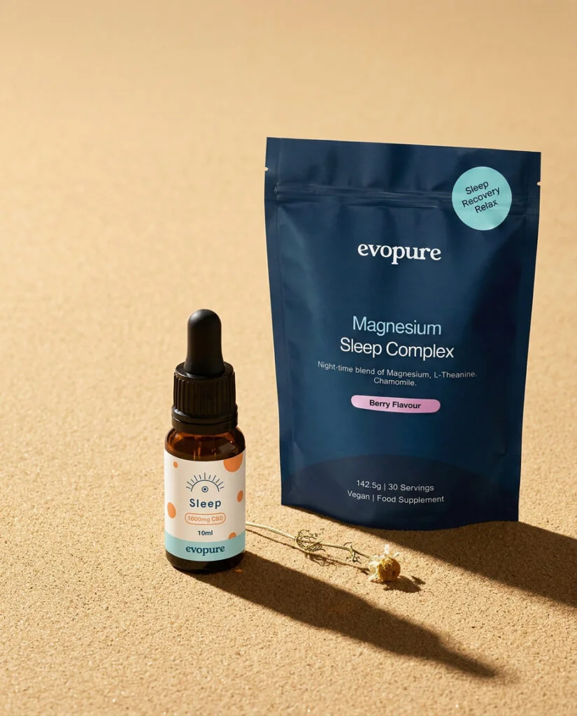 Evopure Sleep CBD oil beside a Magnesium Sleep Complex pouch