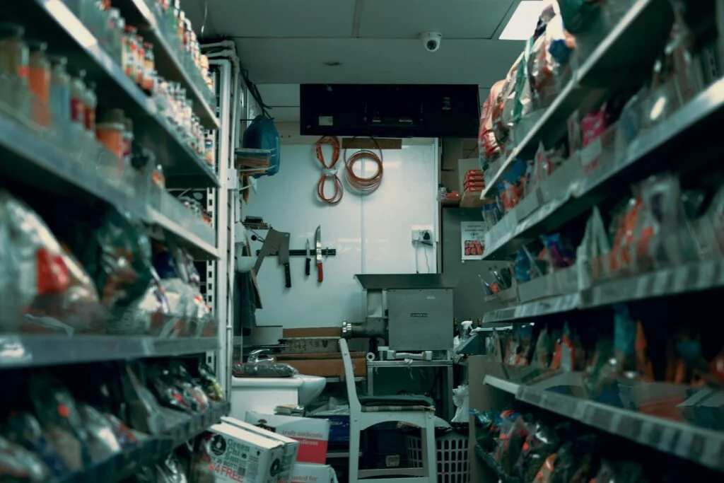 Shop aisle with shelves of products