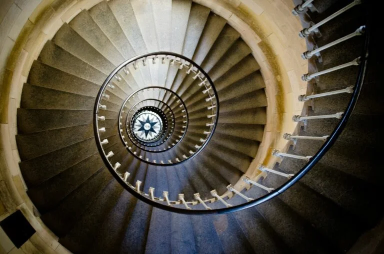 Looking down a spiral staircase, the spinning feeling many people describe with vertigo