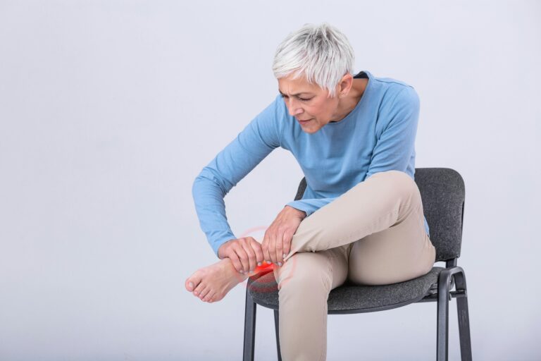 A woman suffering from pain in her leg