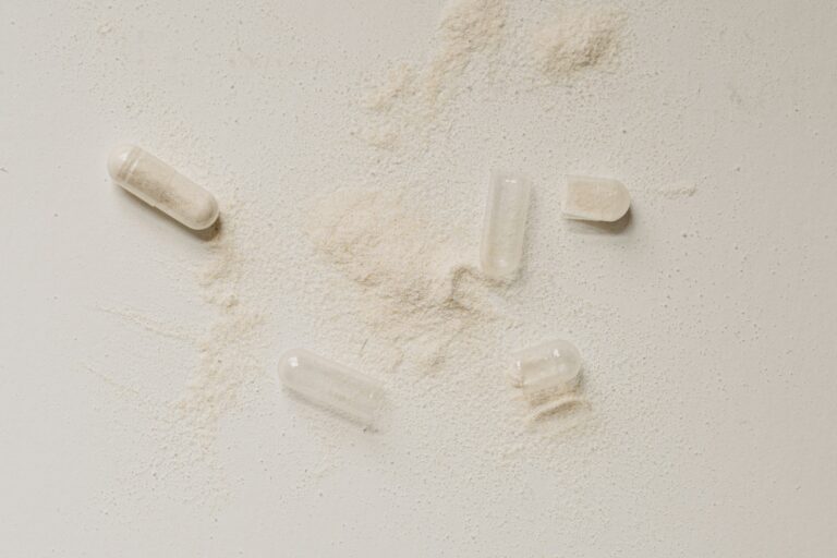 a group of pills with powder on the table