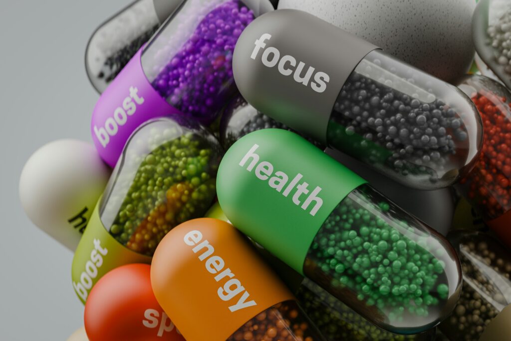 a bunch of capsules with focus words on them