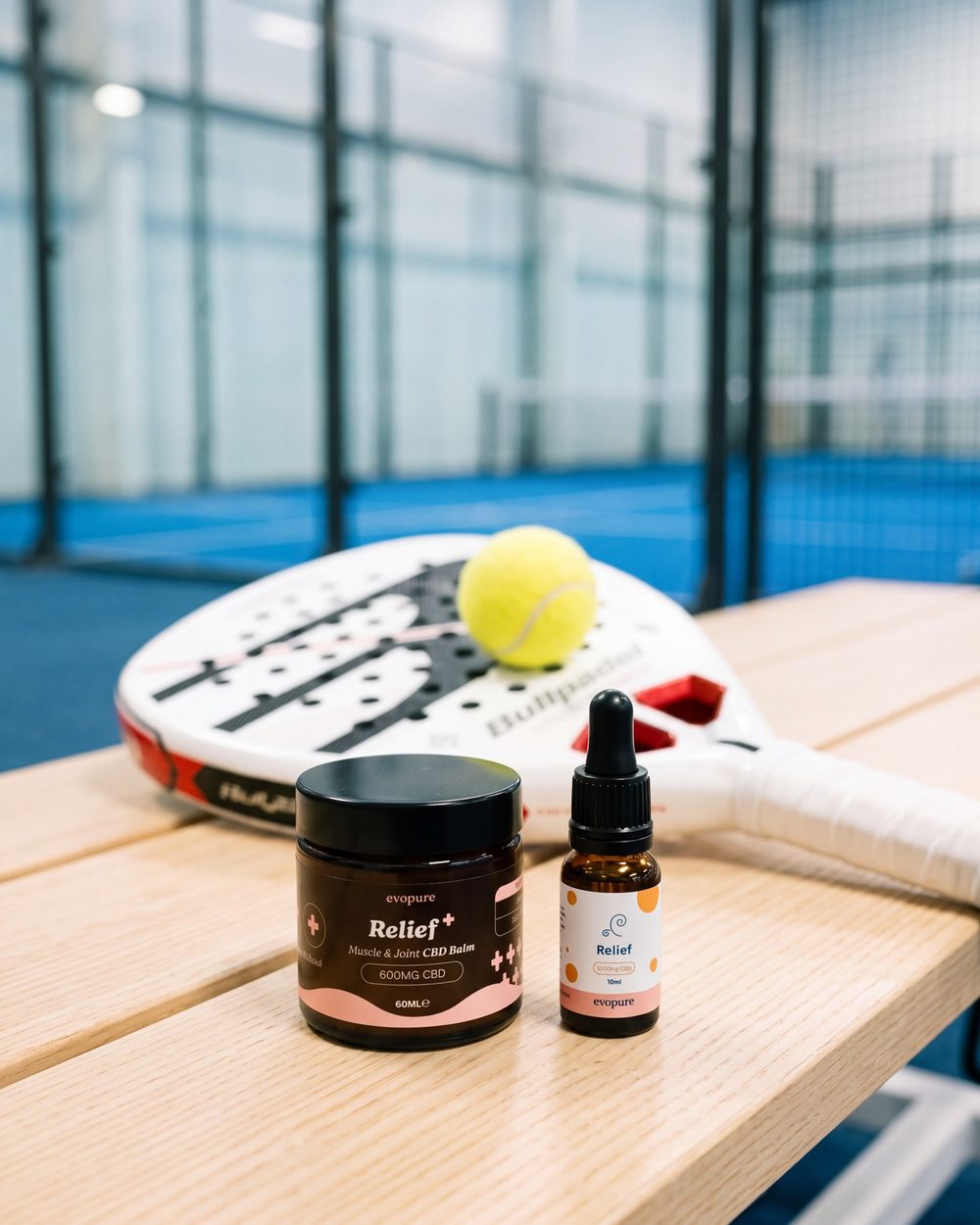 Relief+ CBD Balm and Relief oil on a padel club bench
